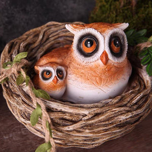 Mother & Baby Owl On The Swing